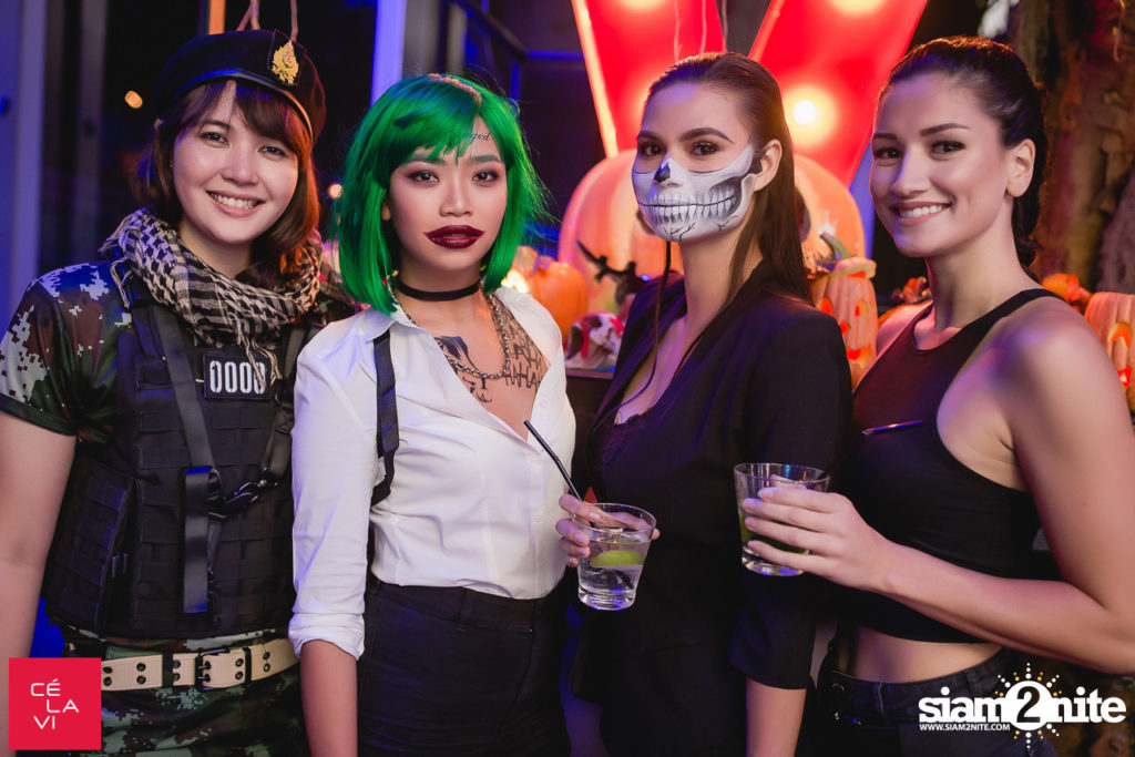 joker, tomb raider, skeleton and military girl at halloween party bangkok